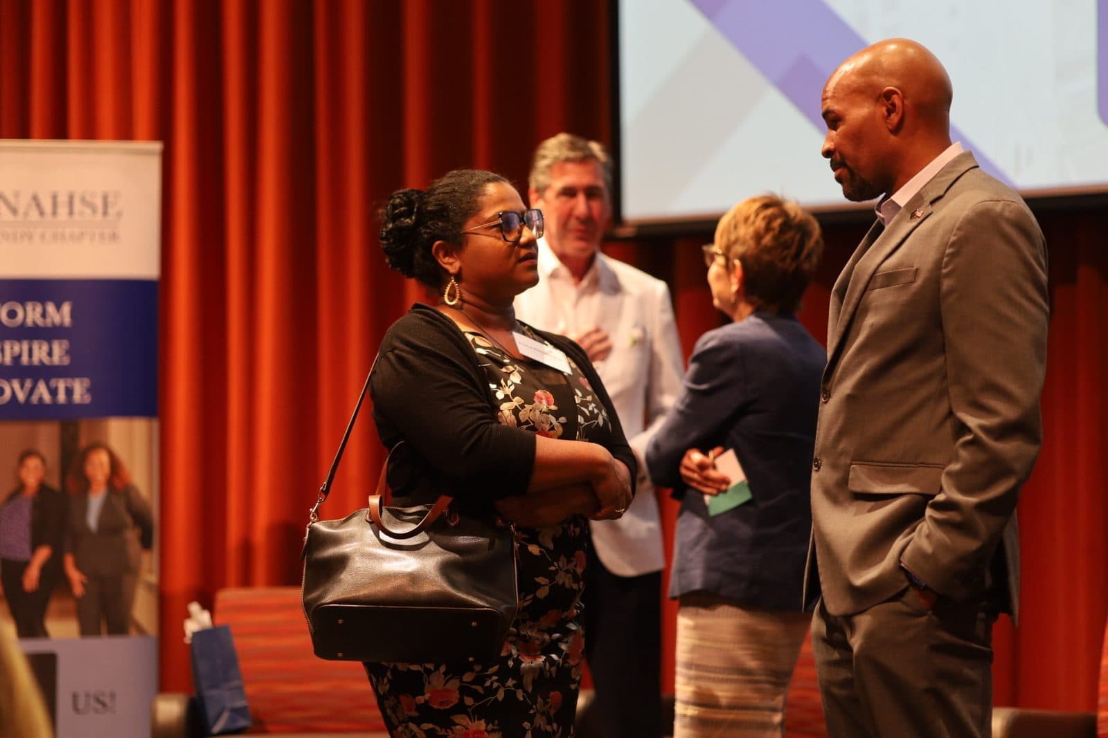 Guests networking at a corporate event