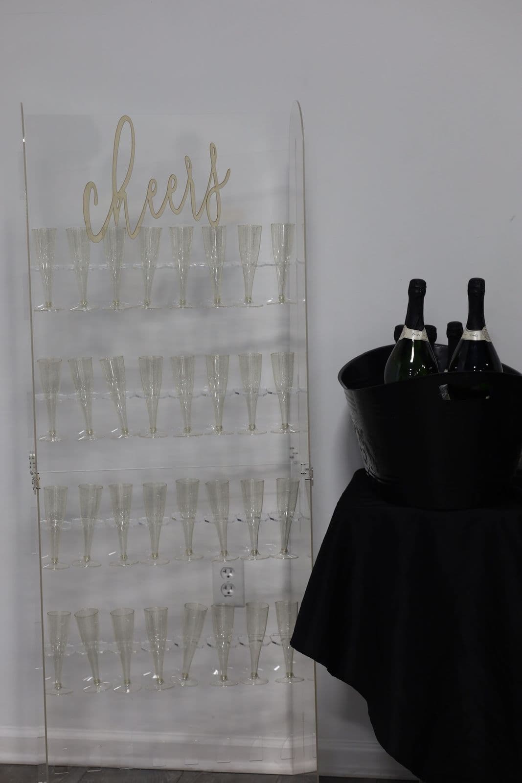 Champagne flute wall styled for a celebration